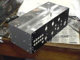 Side panels attached on the bottom panel assy